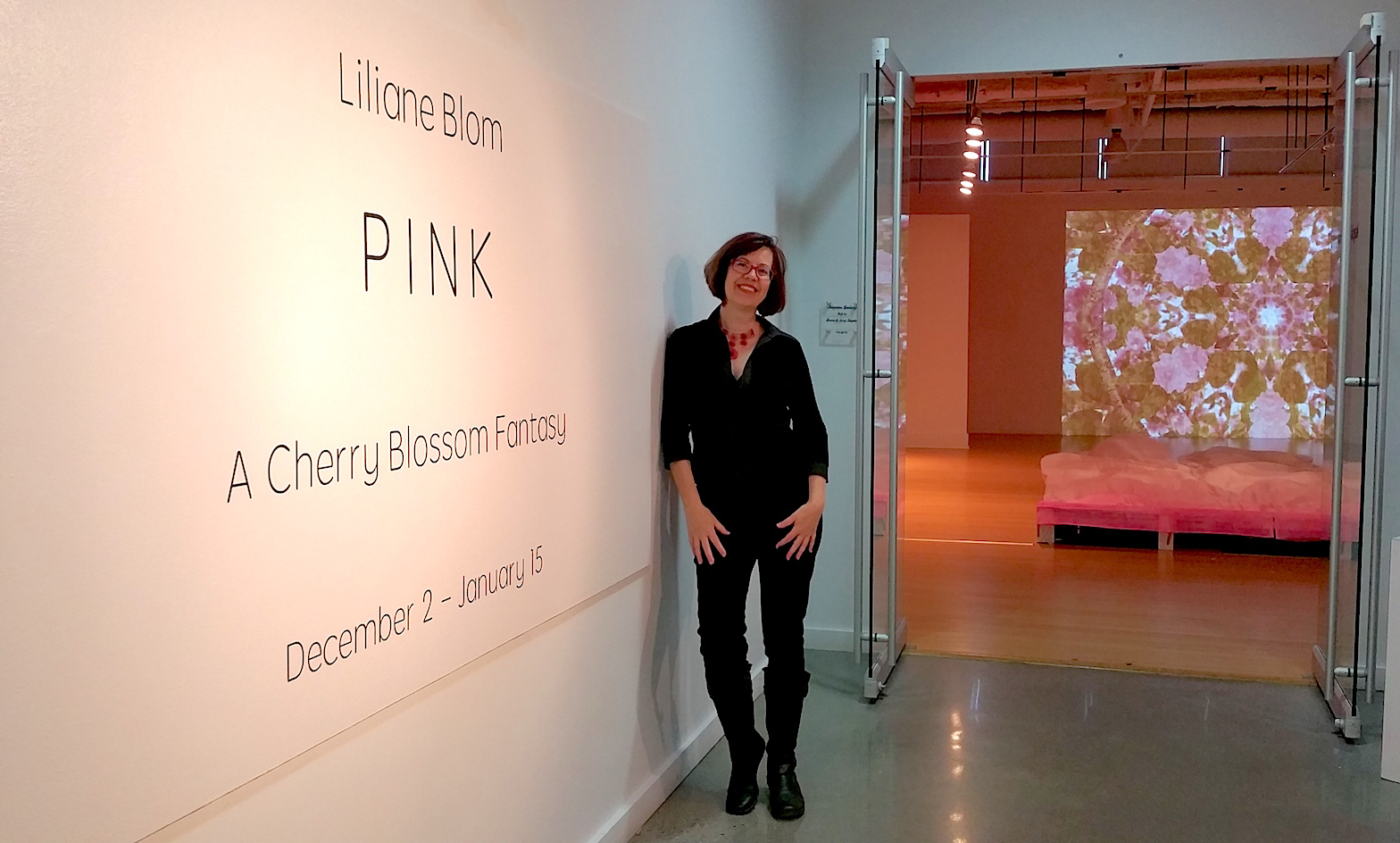 Gallery 1 - Liliane Blom at the entrance to her exhibit, “Pink – A Cherry Blossom Fantasy,” at VisArts in Rockville.